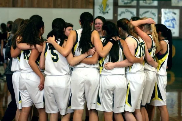 basketball team defense huddle
